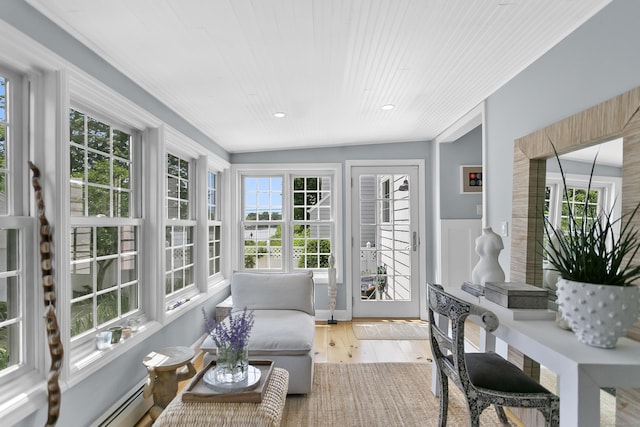 521 Lake Ave, Bridgeport, CT 06605 - sunroom / solarium featuring healthy amount of natural light, wood finished floors, baseboard heating, and recessed lighting
