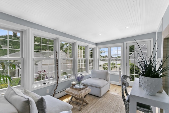 521 Lake Ave, Bridgeport, CT 06605 - sunroom / solarium with plenty of natural light, wood finished floors, recessed lighting, a water view, and a baseboard radiator