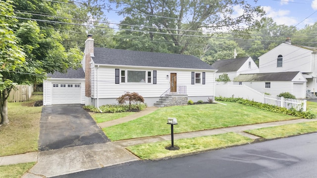 106 Lakeview Ave, West Haven, CT 06516 - view of front facade featuring asphalt driveway, an attached garage, a chimney, and roof with shingles