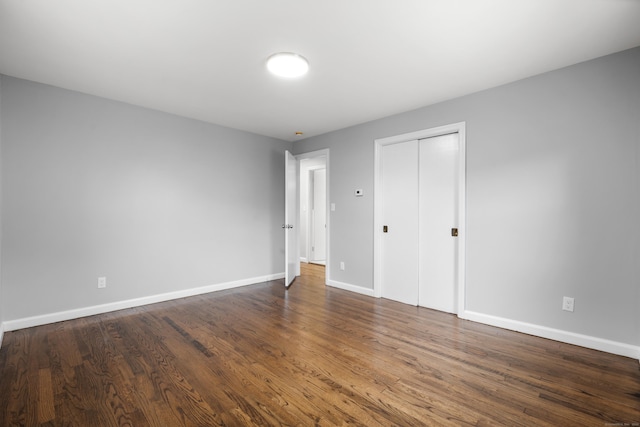 106 Lakeview Ave, West Haven, CT 06516 - unfurnished bedroom featuring wood finished floors and a closet