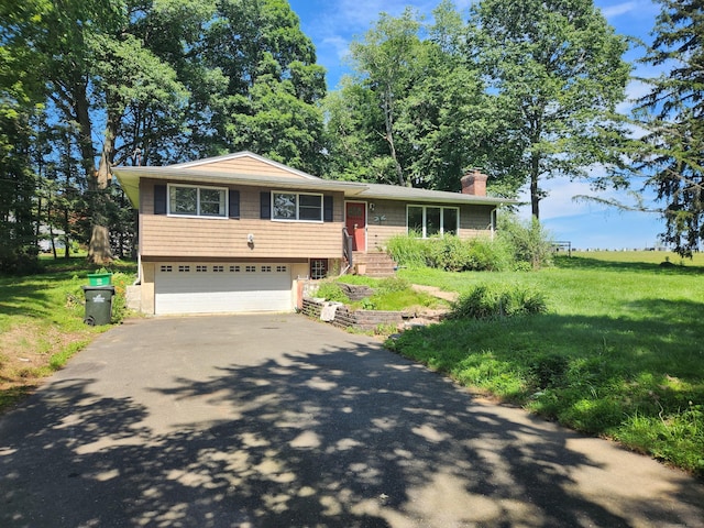 15 Juniper Rd, Newtown, CT 06470 - tri-level home with a chimney, driveway, a garage, and a front lawn