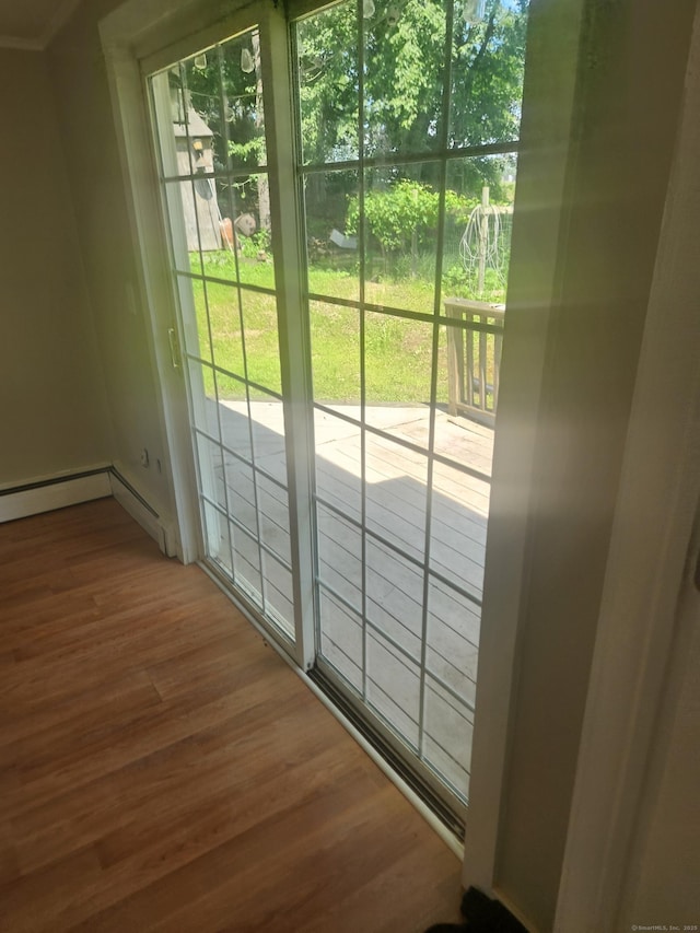 15 Juniper Rd, Newtown, CT 06470 - doorway featuring wood finished floors and baseboard heating