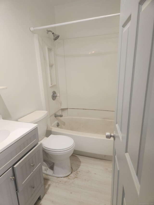 15 Juniper Rd, Newtown, CT 06470 - bathroom with vanity, shower / bathtub combination, and wood finished floors