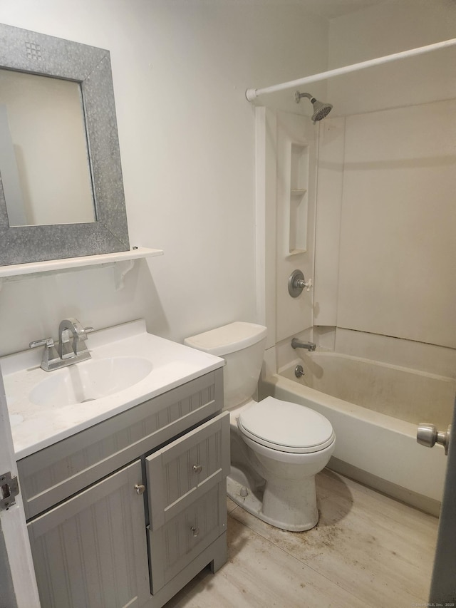 15 Juniper Rd, Newtown, CT 06470 - bathroom featuring shower / bathtub combination, vanity, and wood finished floors