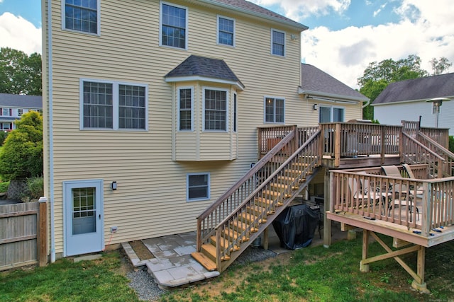 357 D Welton Way, Thomaston, CT 06787 - rear view of property with stairway, roof with shingles, a wooden deck, and a patio