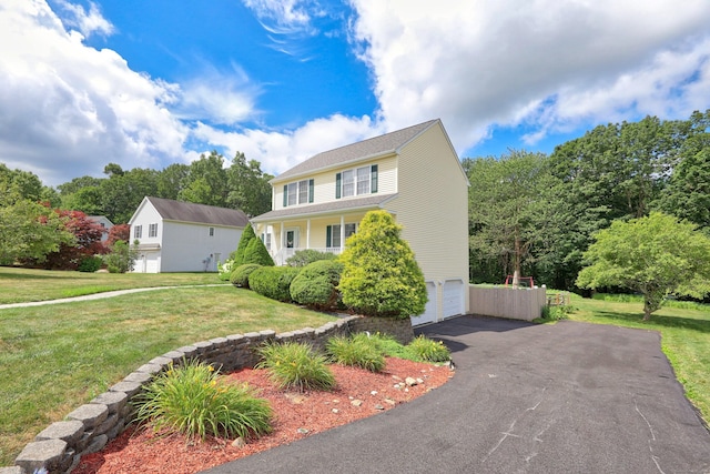 357 D Welton Way, Thomaston, CT 06787 - colonial-style house with asphalt driveway, an attached garage, and a front yard