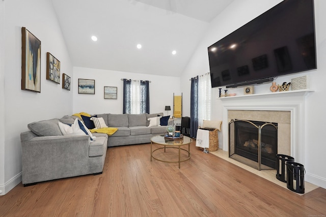 357 D Welton Way, Thomaston, CT 06787 - living area featuring high vaulted ceiling, wood finished floors, a tiled fireplace, and recessed lighting