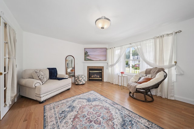 357 D Welton Way, Thomaston, CT 06787 - living room featuring wood finished floors and a tile fireplace
