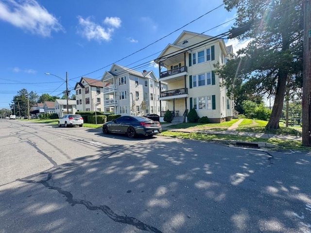 150 Greenwood St, New Britain, CT 06051 - view of asphalt road featuring street lighting, sidewalks, and curbs