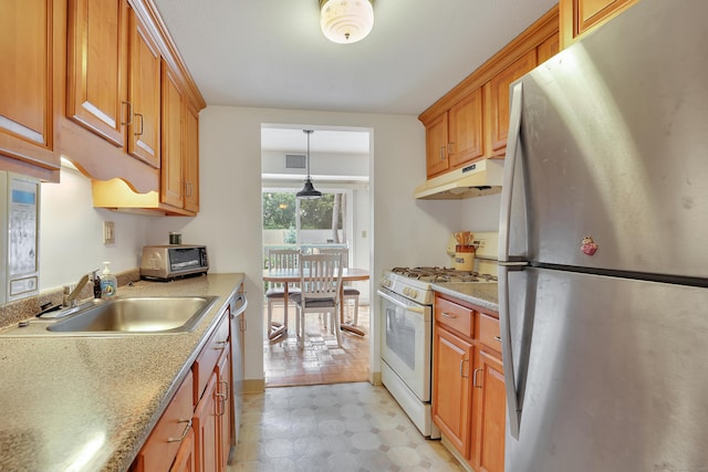 106 Brookwood Dr Apt D, Rocky Hill, CT 06067 - kitchen with appliances with stainless steel finishes, under cabinet range hood, light flooring, and light countertops