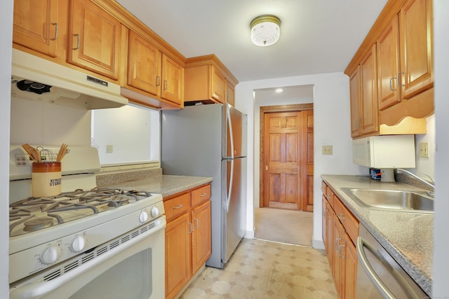 106 Brookwood Dr Apt D, Rocky Hill, CT 06067 - kitchen with appliances with stainless steel finishes, under cabinet range hood, light countertops, light flooring, and brown cabinetry