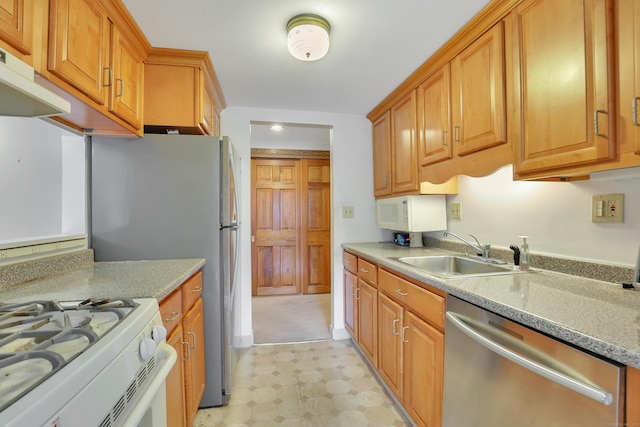 106 Brookwood Dr Apt D, Rocky Hill, CT 06067 - kitchen with stainless steel appliances, brown cabinets, light flooring, extractor fan, and recessed lighting