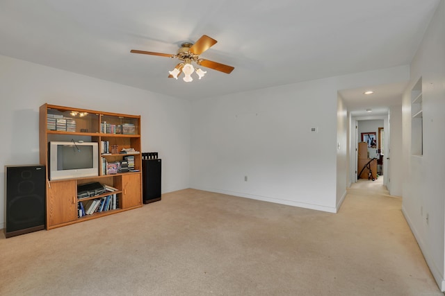 106 Brookwood Dr Apt D, Rocky Hill, CT 06067 - unfurnished living room with light colored carpet and a ceiling fan