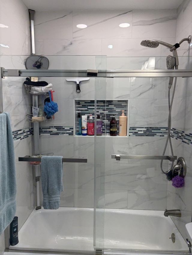55 Mill Plain Rd Unit 17-6, Danbury, CT 06811 - bathroom featuring bath / shower combo with glass door