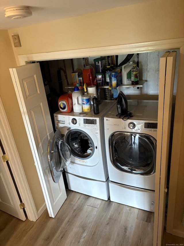 55 Mill Plain Rd Unit 17-6, Danbury, CT 06811 - laundry room featuring washing machine and dryer and wood finished floors