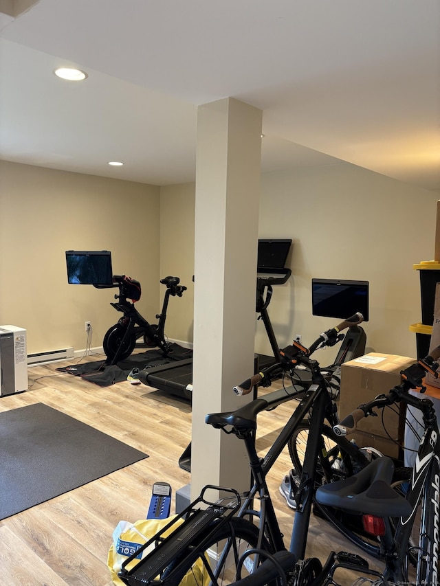 55 Mill Plain Rd Unit 17-6, Danbury, CT 06811 - exercise area featuring wood finished floors, recessed lighting, and a baseboard radiator