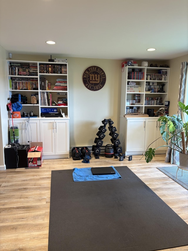 55 Mill Plain Rd Unit 17-6, Danbury, CT 06811 - workout area with wood finished floors and recessed lighting