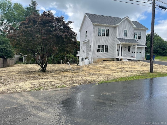 30 Bayberry Ln, Stratford, CT 06614 - view of front facade featuring a garage and driveway