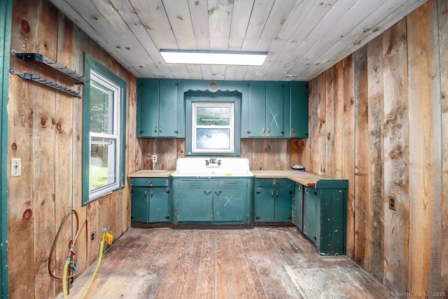 16 Oak St, New Fairfield, CT 06812 - kitchen with wooden walls, light wood finished floors, light countertops, and wood ceiling