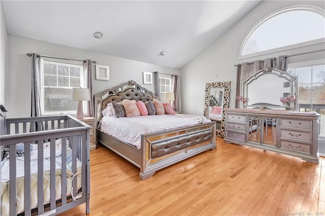 12 Sunset Ave, Trumbull, CT 06611 - bedroom featuring multiple windows, light wood-type flooring, and high vaulted ceiling