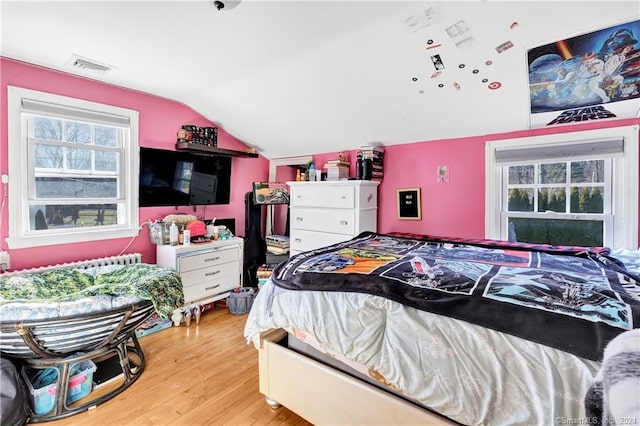 12 Sunset Ave, Trumbull, CT 06611 - bedroom with lofted ceiling and light wood-style floors