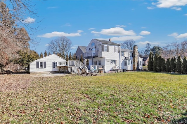 12 Sunset Ave, Trumbull, CT 06611 - back of house featuring a wooden deck and a lawn