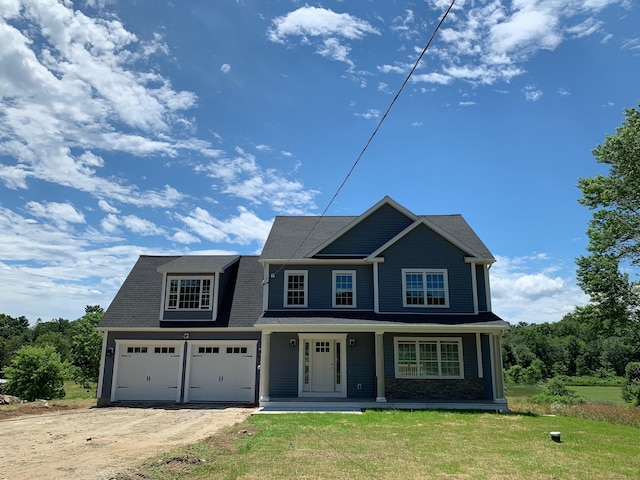 LOT8-5 Old Tatnic Hill Rd, Brooklyn, CT 06234 - view of front of house with covered porch, dirt driveway, a front lawn, and a shingled roof