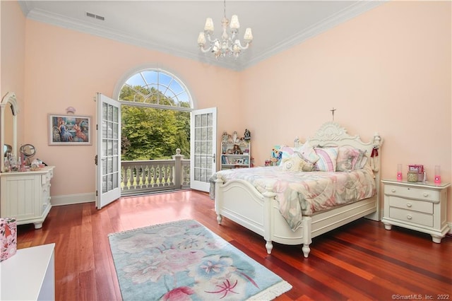 bedroom featuring access to exterior, ornamental molding, dark hardwood / wood-style floors, and a chandelier