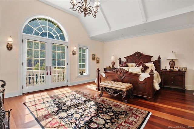 bedroom featuring multiple windows, an inviting chandelier, french doors, and wood-type flooring