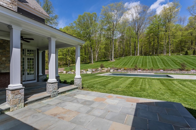 view of patio with a porch and a ceiling fan