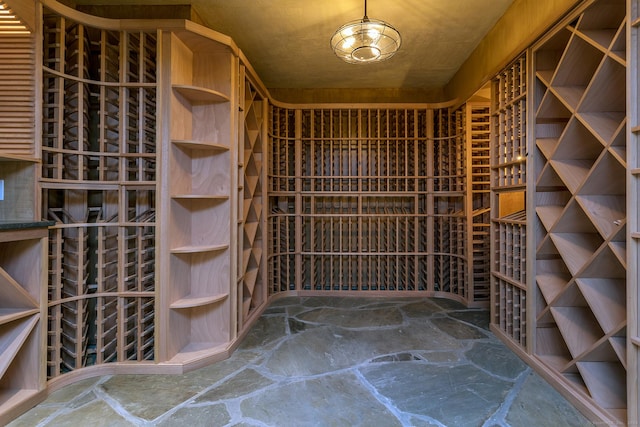 wine room with stone flooring