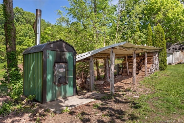 view of shed / structure with a lawn