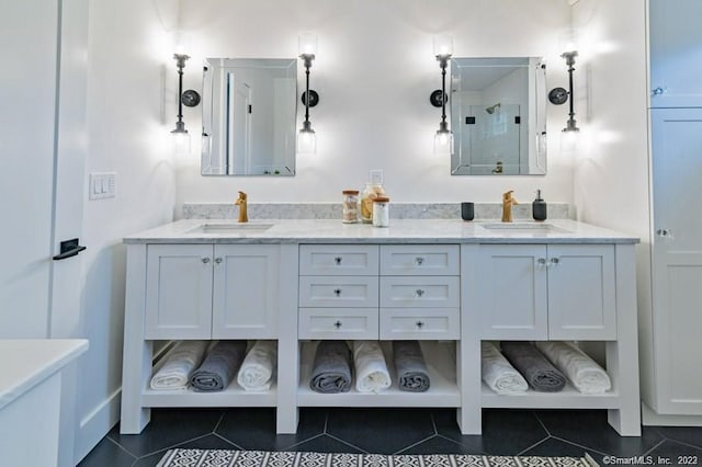 bathroom featuring tile flooring and double sink vanity