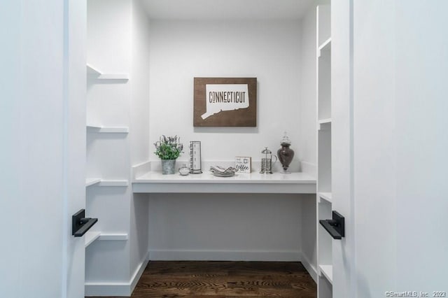 bathroom with hardwood / wood-style floors