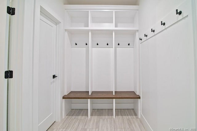 mudroom with light tile flooring