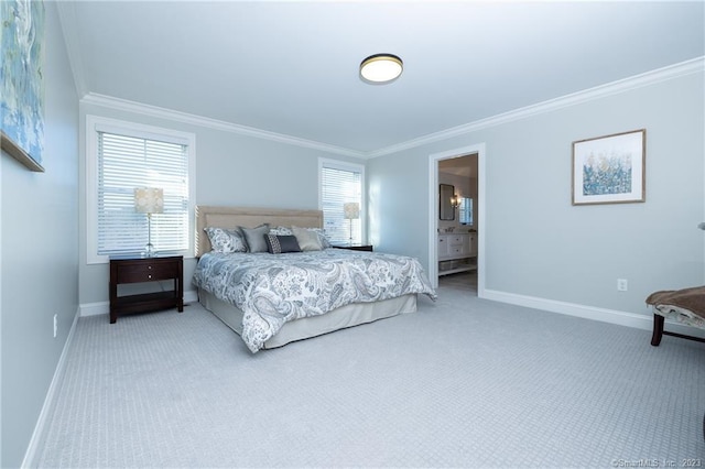 bedroom featuring light carpet, connected bathroom, and multiple windows