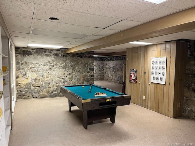 playroom featuring wooden walls, billiards, and a drop ceiling