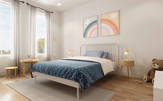 bedroom featuring light wood-type flooring