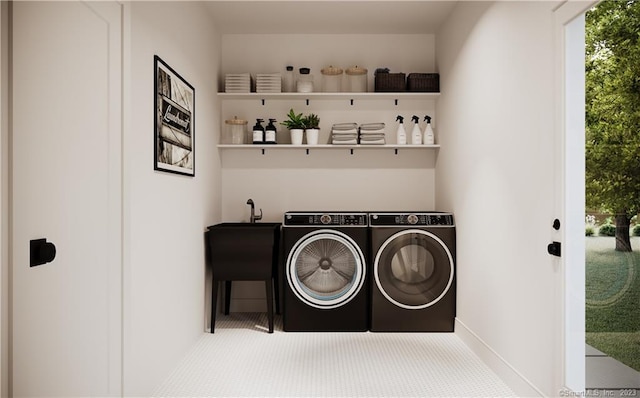 laundry area with washing machine and clothes dryer