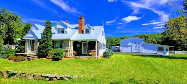 back of house featuring a yard