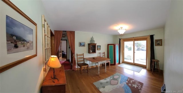 foyer with dark hardwood / wood-style floors