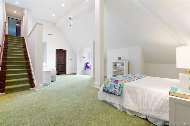 bedroom with high vaulted ceiling, ceiling fan, and light colored carpet