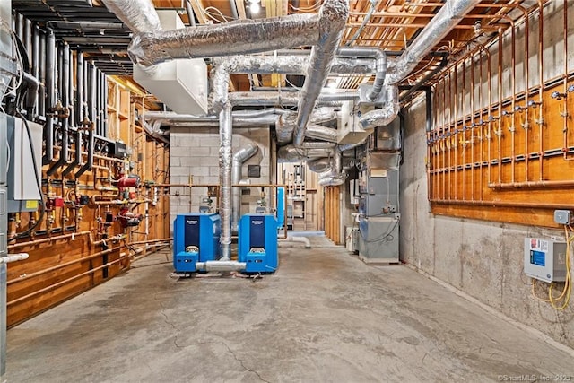 utility room featuring heating utilities