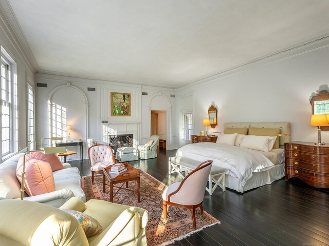 27 Macedonia Brook Rd, Kent, CT 06757 - bedroom featuring ornamental molding, wood-type flooring, and a fireplace