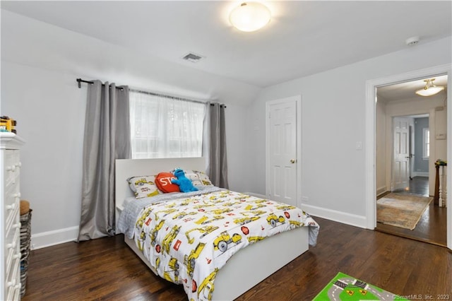 bedroom featuring dark hardwood / wood-style floors