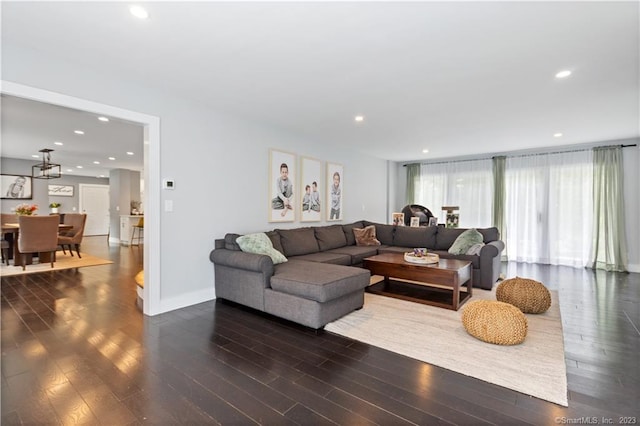 living room featuring dark wood-type flooring