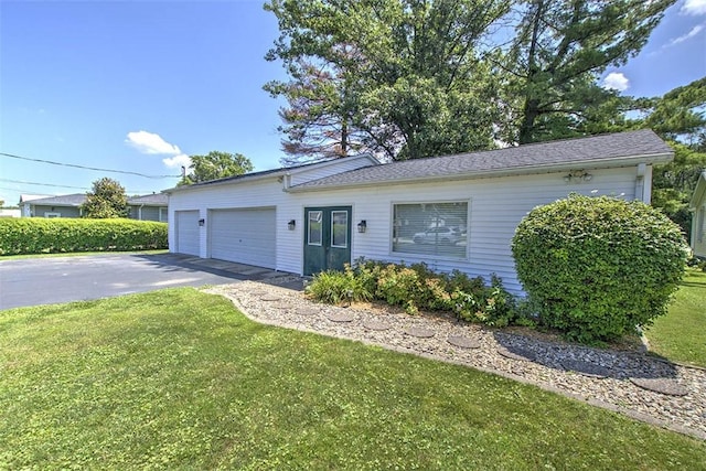 220 W Main St, Mt Zion, IL 62549 - single story home with a garage, driveway, and a front yard