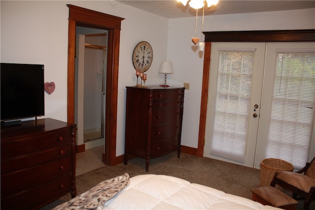 bedroom with carpet and french doors