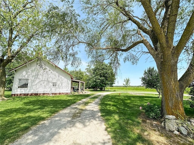 2281 US Rte 40, Casey, IL 62420 - view of side of property with a yard and dirt driveway