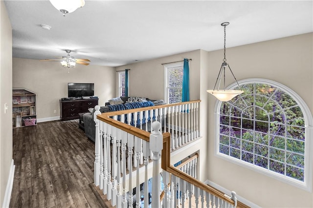 1435 Ashland Ave, Mt Zion, IL 62549 - hall featuring an upstairs landing, baseboards, dark wood-type flooring, and plenty of natural light
